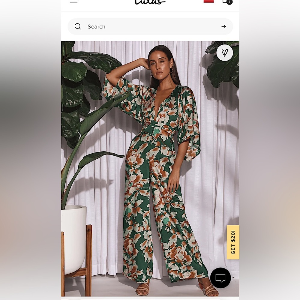 From Sunrise Teal floral print bell sleeve jumpsuit